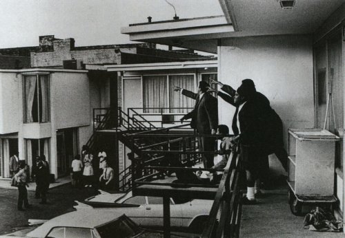 People pointing towards where the shots were fired that killed Martin Luther King