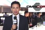 Audience reaction to OmniCorp’s CES keynote