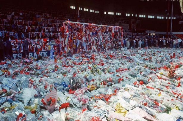 The Kop and penalty area at Anfield covered in floral tributes after the 1989 Hillsborough disaster